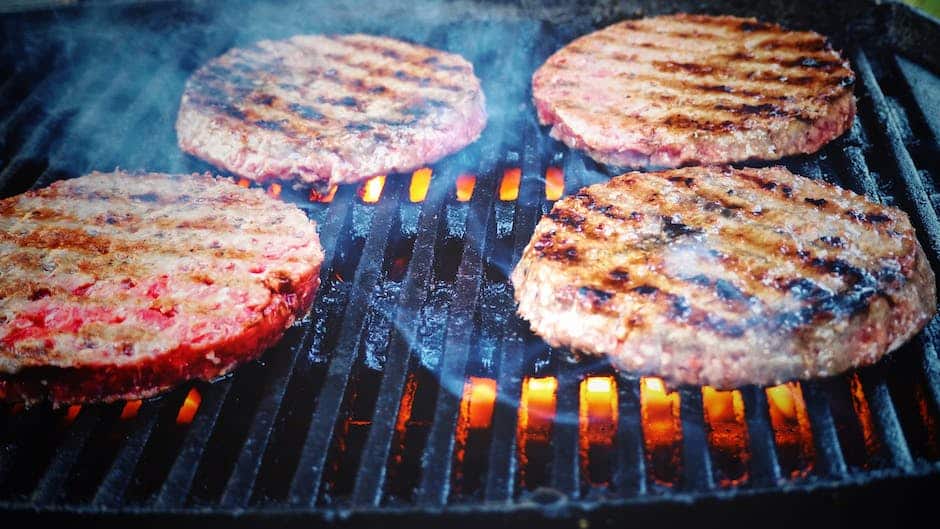 Grill with labeled high heat, medium heat, and low heat zones